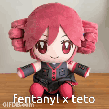 Stuffed Doll With Red Hair GIF