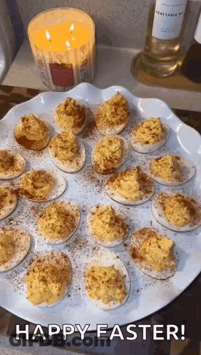 Stuffed Eggs With Candle And Happy Easter GIF