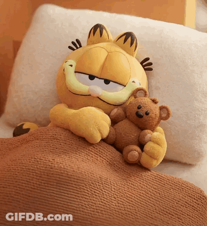 Stuffed Garfield Laying In Bed With Teddy Bear GIF
