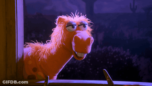 Stuffed Horse Looking Out Window GIF