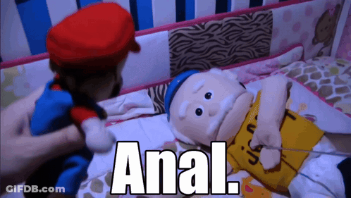 Stuffed Mario And Peanut Man Laying On Bed Saying Anal GIF