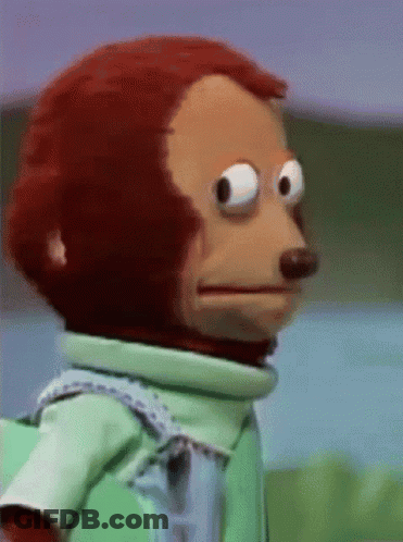 Stuffed Monkey In Green Shirt And Overalls GIF