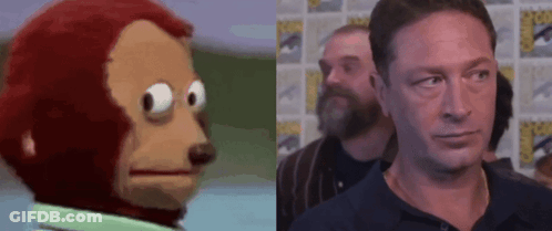 Stuffed Monkey Next To Man GIF