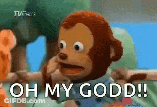 Stuffed Monkey Talking On Cell Phone GIF