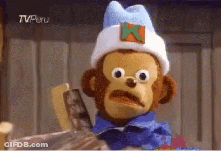 Stuffed Monkey Wearing White Hat With K GIF