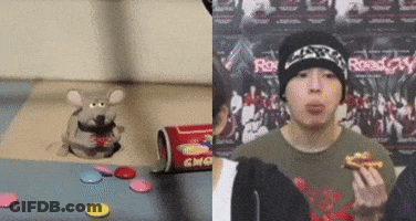 Stuffed Mouse Next To Person Eating Sandwich GIF