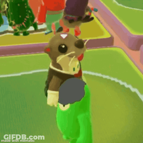 Stuffed Otter Wearing Bow Tie And Wreath GIF