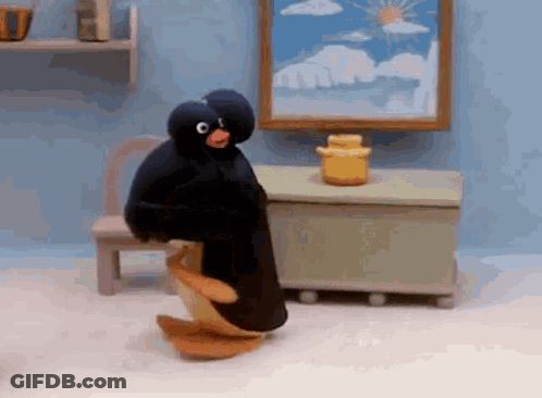 Stuffed Penguin Dancing In Room GIF