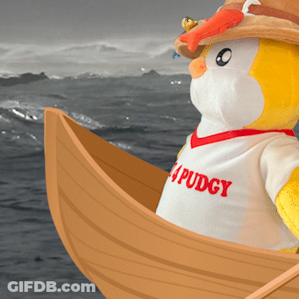 Stuffed Penguin In Puddy Shirt On Boat In Ocean GIF