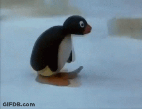 Stuffed Penguin Sitting On Ice GIF