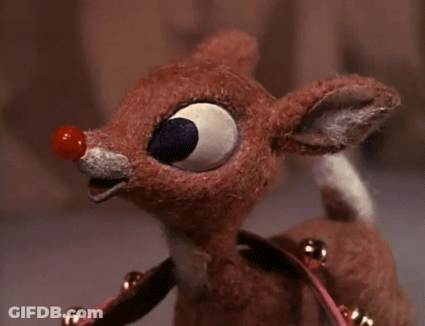 Stuffed Reindeer With Red Nose And Bells GIF