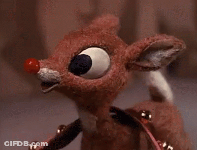 Stuffed Reindeer With Red Nose And Bells GIF