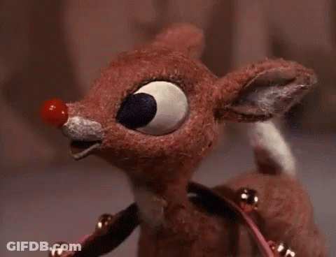Stuffed Reindeer With Red Nose And Bells GIF