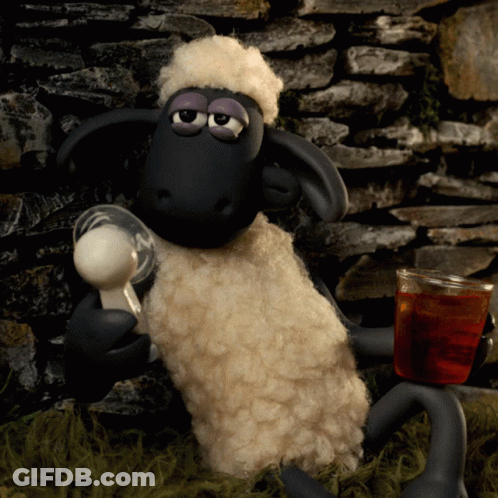 Stuffed Sheep Holding Spoon And Tea Cup GIF
