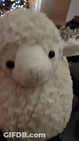 Stuffed Sheep With Christmas Tree GIF