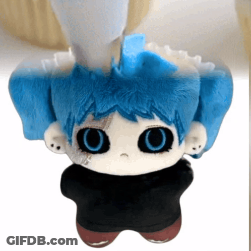Stuffed Toy With Blue Hair And Big Eyes GIF