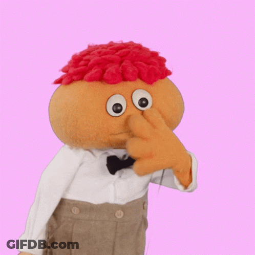 Stuffed Toy With Bow Tie And Red Hair GIF