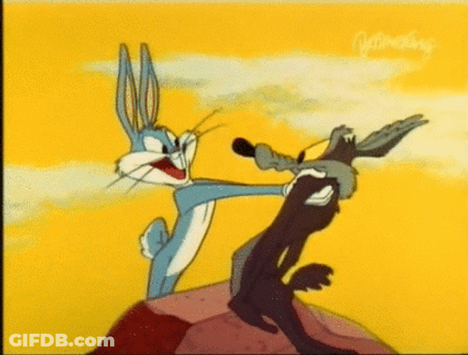 Stunned Wile E Coyote Bugs Bunny Kiss GIF