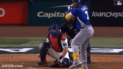 Suarez Baseball Player Swinging At Pitch GIF