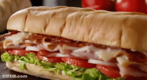 Sub Sandwich With Ham Bacon Lettuce Tomatoes Cheese GIF