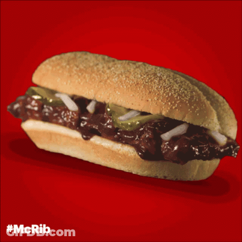 Sub Sandwich With Pickles And Onions Saying McRib GIF