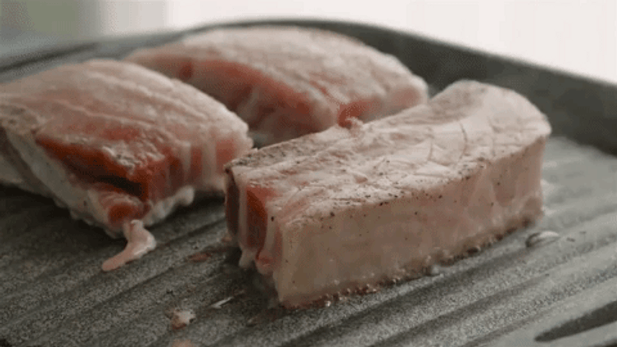 Succulent Slices Meat Sizzling To Perfection GIF