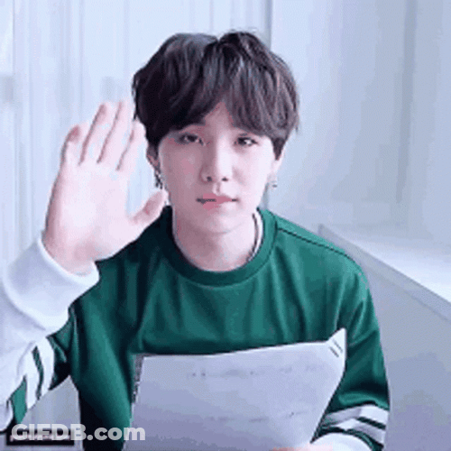 Suga Holding Paper While Saying Goodbye GIF