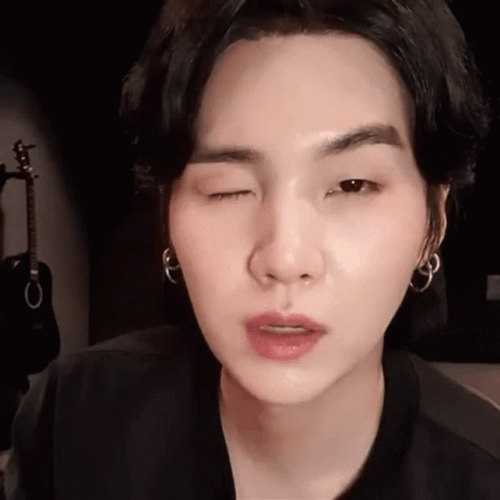 Suga Winking While Raising Eyebrows GIF