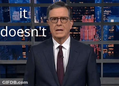 Suit And Tie Man At Wall Saying It Doesn't GIF