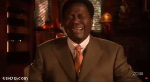 Suit And Tie Man Laughing Before Fox Ad GIF