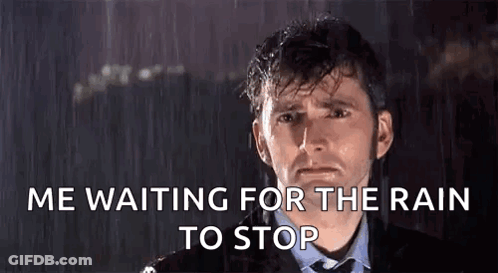 Suit And Tie Man Says Me Waiting For Rain GIF