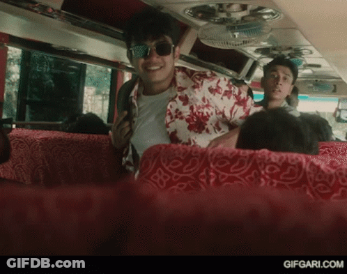 Suit And Tie Man Walking Beside Man In White U Shirt GIF