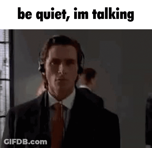 Suit-And-Tie Man With Headphones Be Quiet Im Talking GIF
