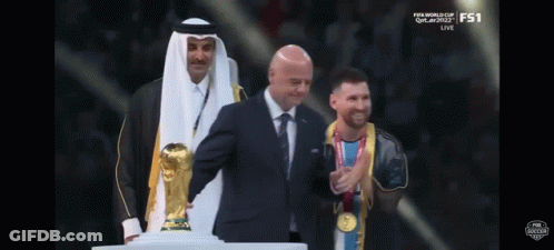 Suit Man Holding Trophy, White Robe Man GIF