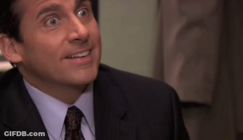 Suit Man Next To Yellow Shirt Man GIF