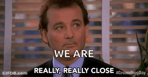 Suit Tie Man Says We Are Really Close GIF