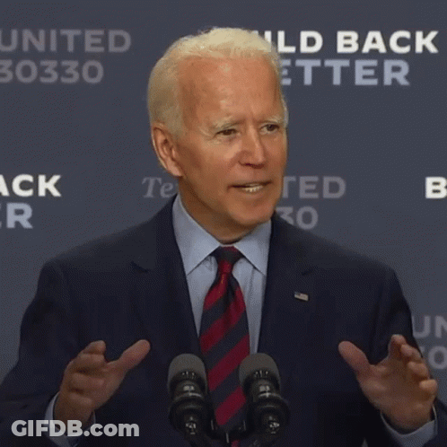 Suit-Wearing Man At Microphone Says He's A Fraud GIF
