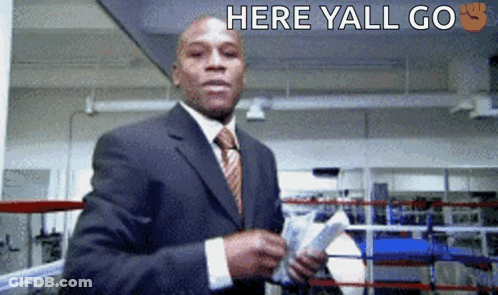 Suited Man Boxing Ring Money Here Yall Go GIF