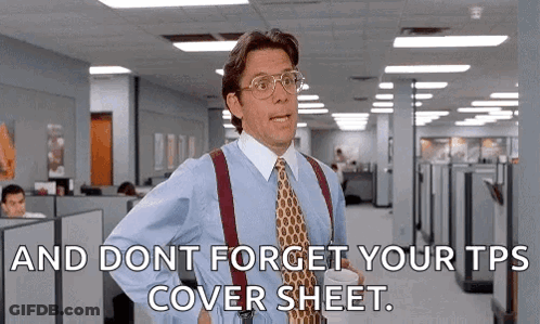Suited Man Holding Coffee And Cover Sheet GIF