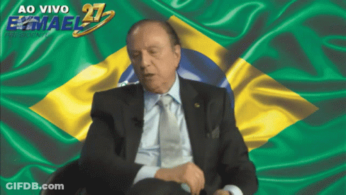 Suited Man In Front Of Flag Ao Vivo Emael GIF