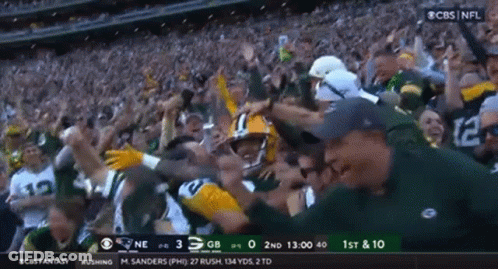 Suited Man Kicking Man On Sidewalk GIF