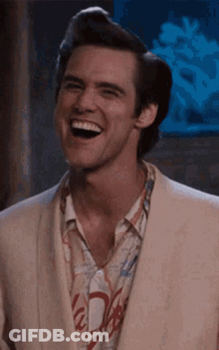 Suited Man Laughing In Coca Cola Shirt GIF