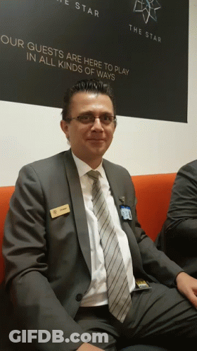 Suited Man Our Guests Are Here To Play GIF
