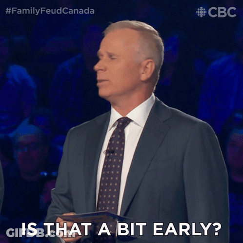 Suited Man Says Is That A Bit Early GIF