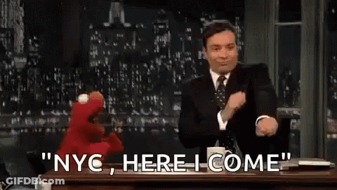 Suited Man With Puppet NYC Here I Come GIF