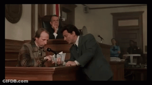 Suited Man With Tie Next To Another Man GIF