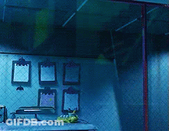 Sulley From Monsters Inc Covering Eyes In Dark Room GIF