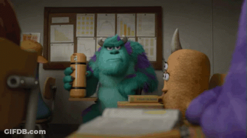 Sulley From Monsters Inc Is Holding A Hammer In His Hand GIF