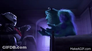 Sulley From Monsters Inc Is Sitting On A Bed Talking To A Man . GIF