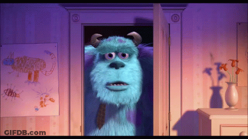Sulley From Monsters Inc Is Standing In The Doorway GIF